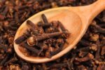 bigstock-Cloves-spice-And-Wooden-Spoo-45136120.jpg